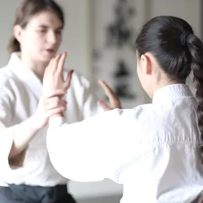 Two students practising an aikido wrist technique