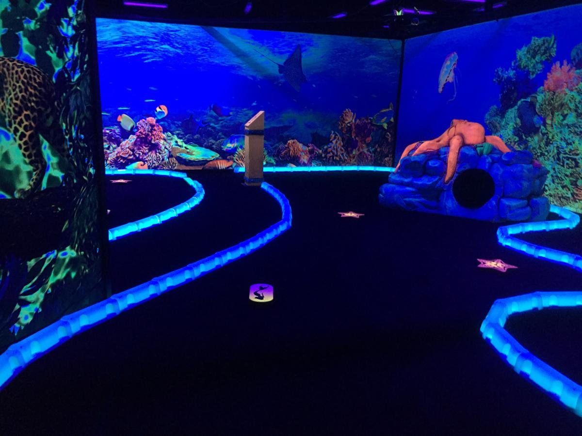 Shankz underwater-themed black light mini golf hole
