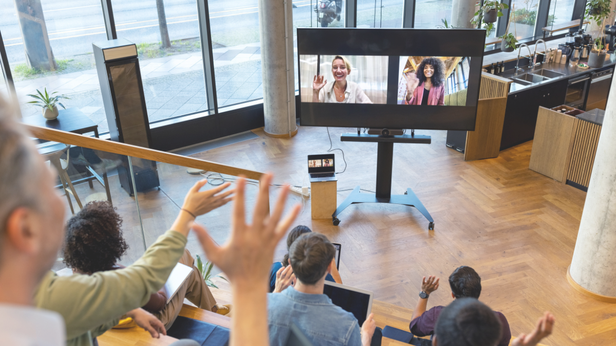 Hybrid team collaborating on a virtual meeting