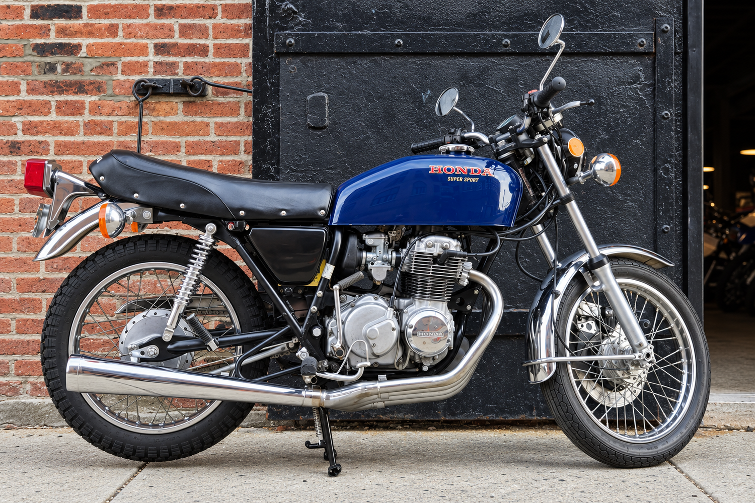 Blue Honda CB400F photographed outside the Brooklyn workshop