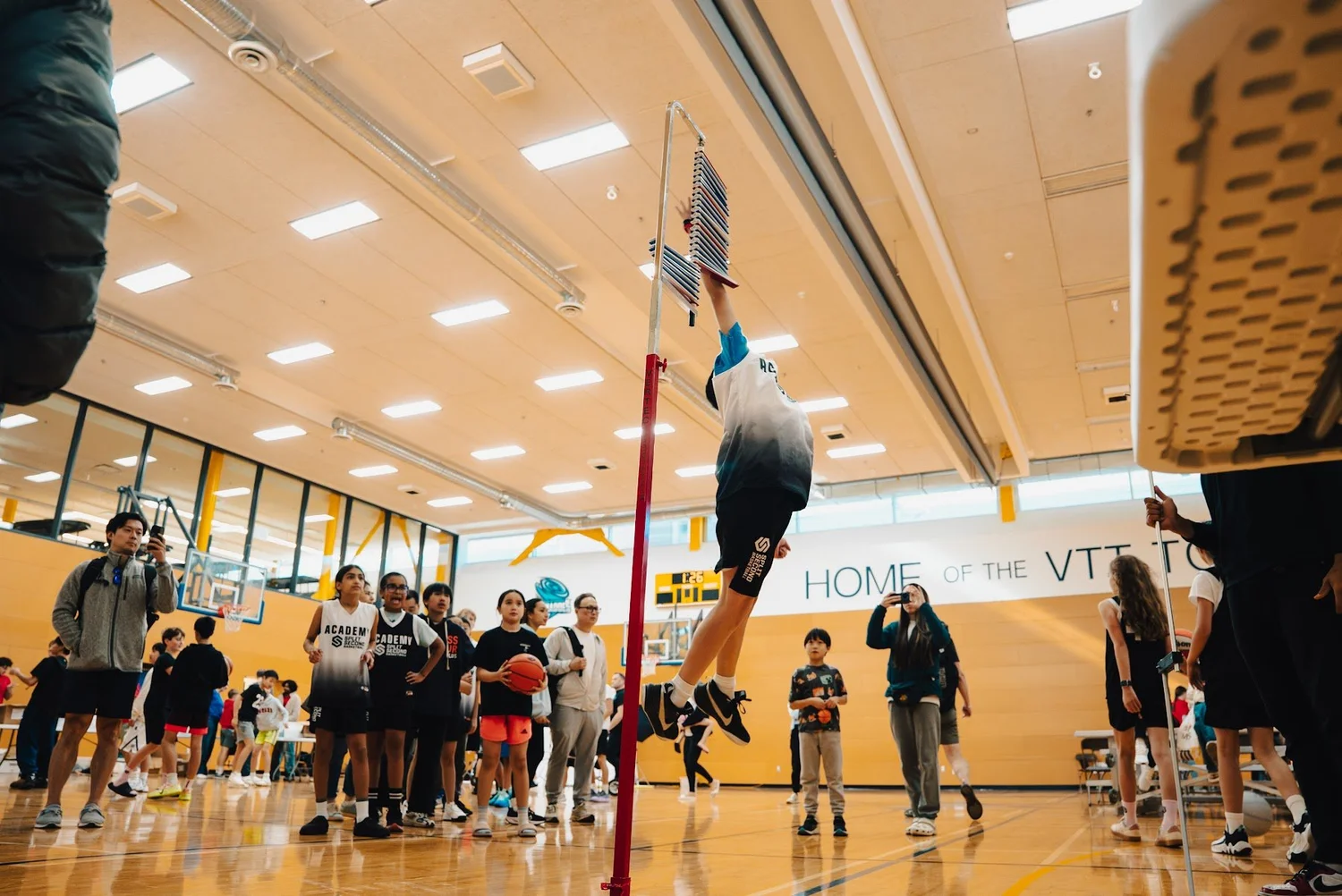 An Academy player jumping to reach the vertical jump vanes