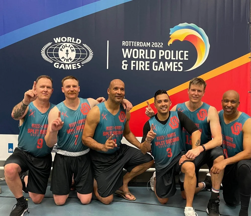 Split Second Basketball team with gold medals at the 2022 World Police and Fire Games in Rotterdam