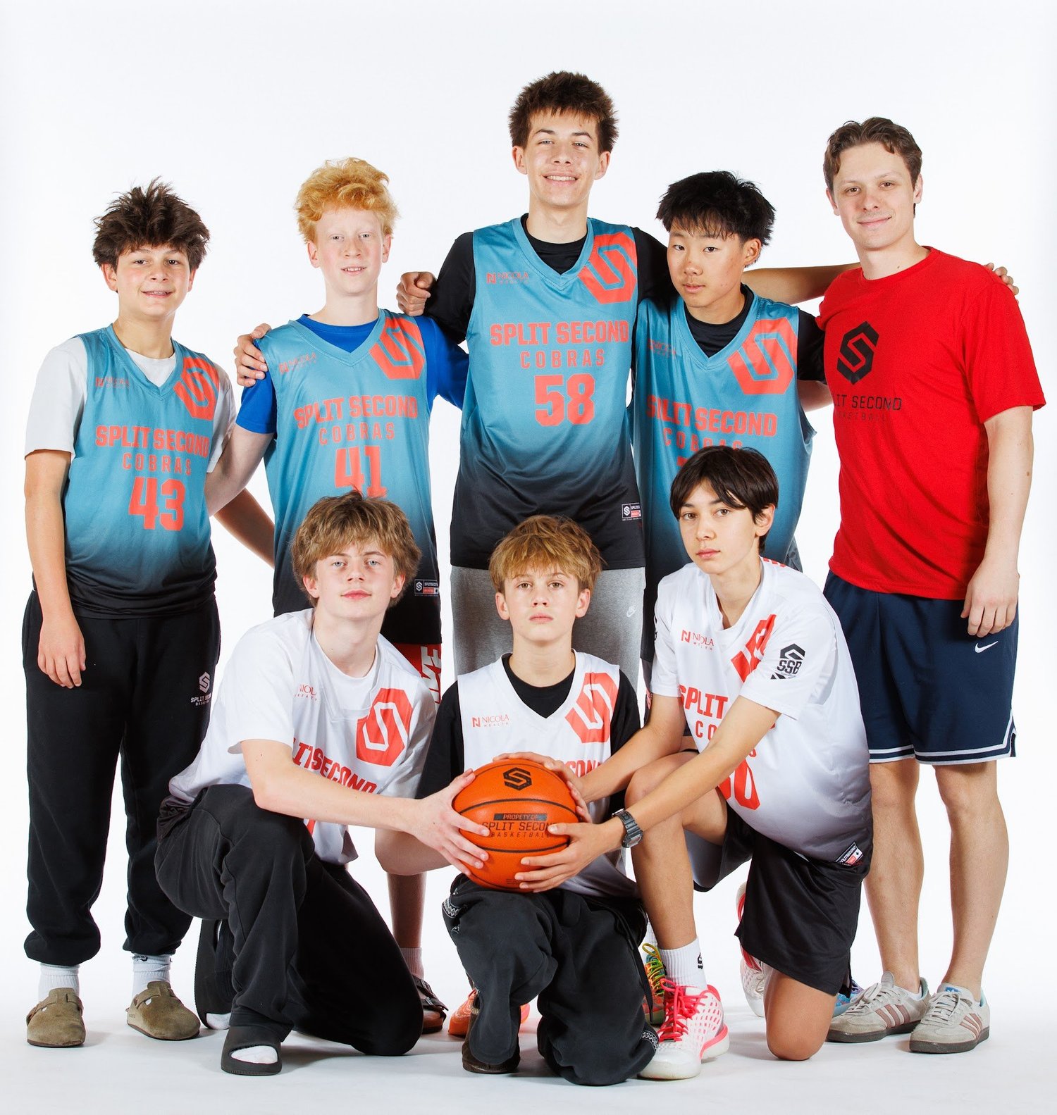 Cobra boys team photo with their coach