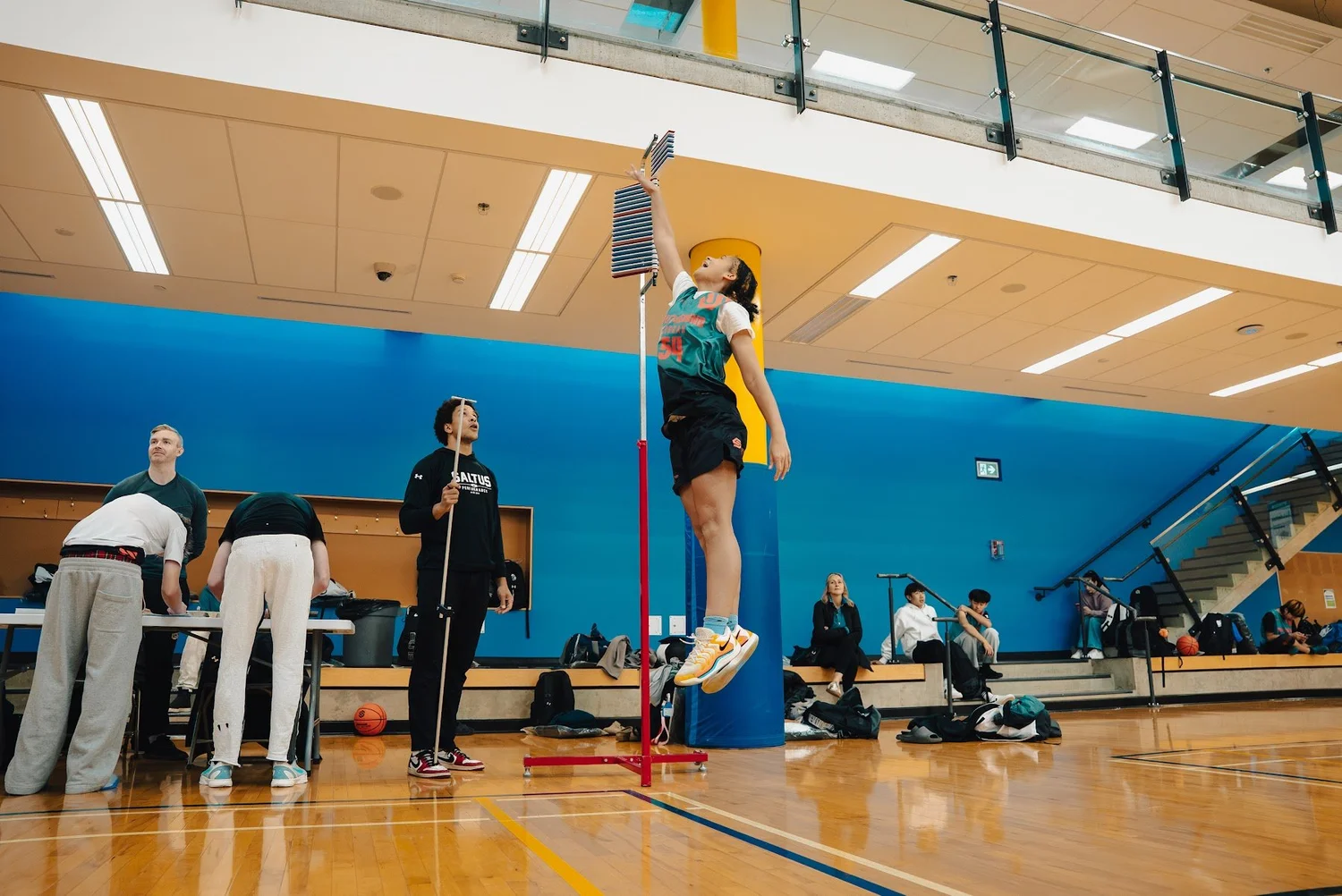 A Cobra player reaching for the top of the vertical jump test