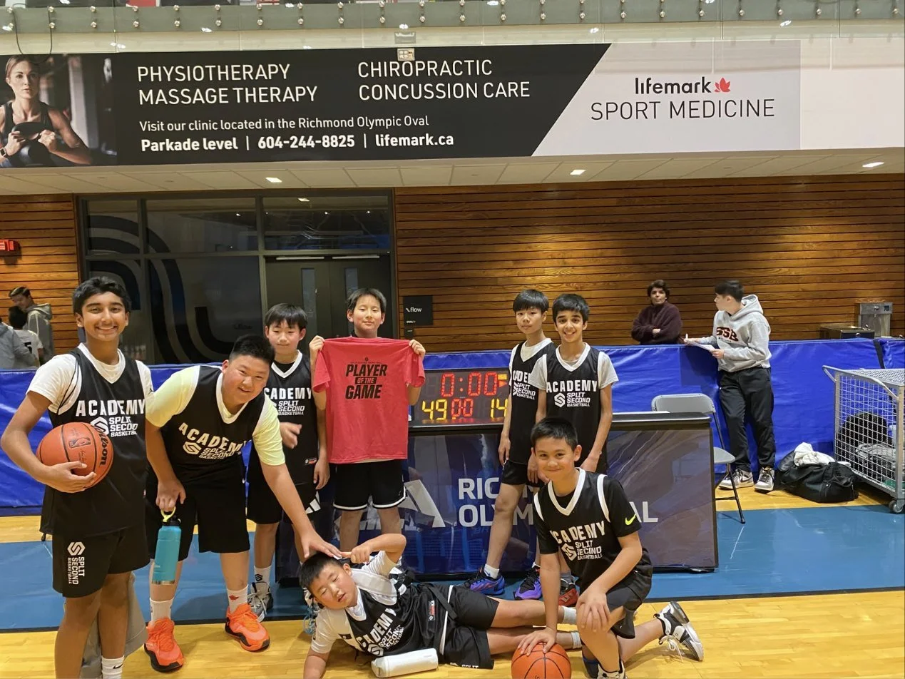 Charlie's team celebrating with the Player of the Game shirt