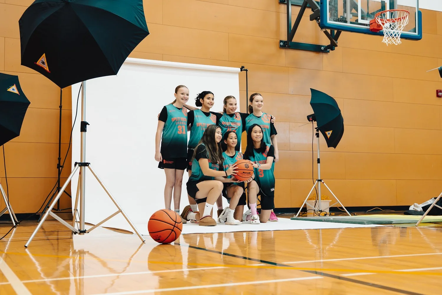 Cobra girls team posing for a team photo on the studio set at VTT