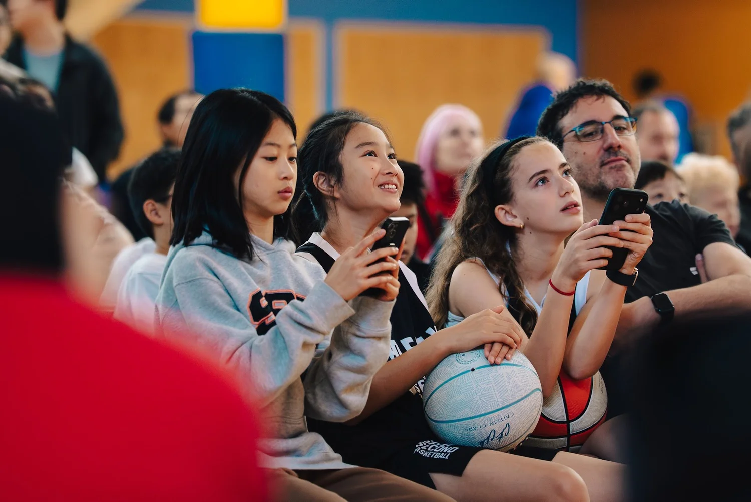 Academy players playing Kahoot on their phones