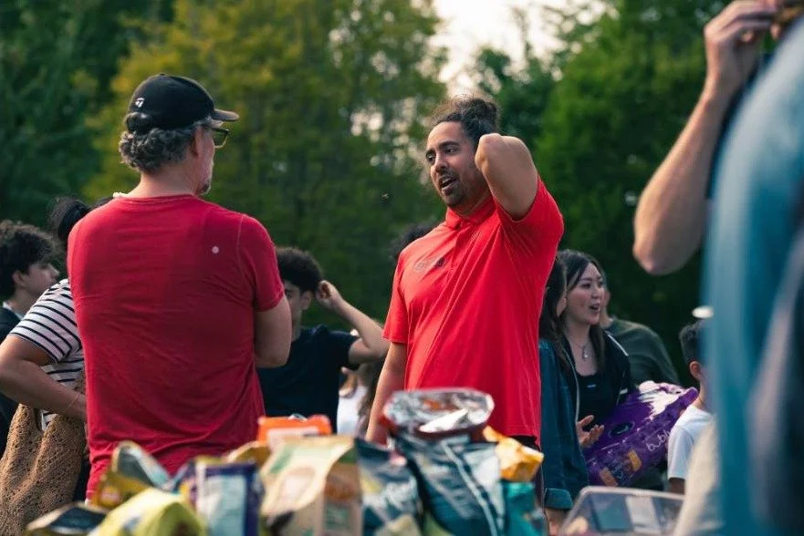 ED laughing with families at the Cobra year-end gathering