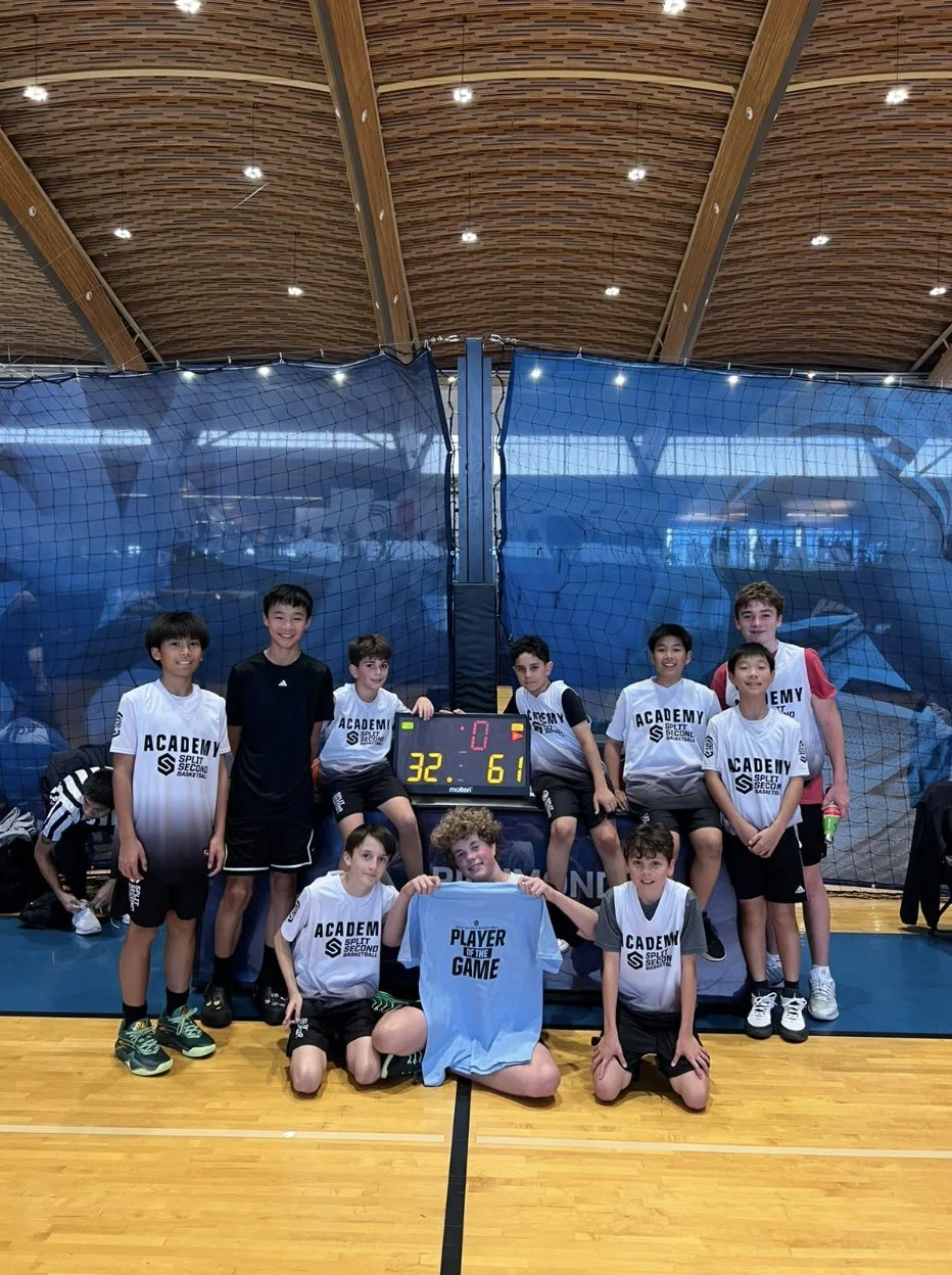 The Bulldogs team photo with Harley holding the Player of the Game shirt