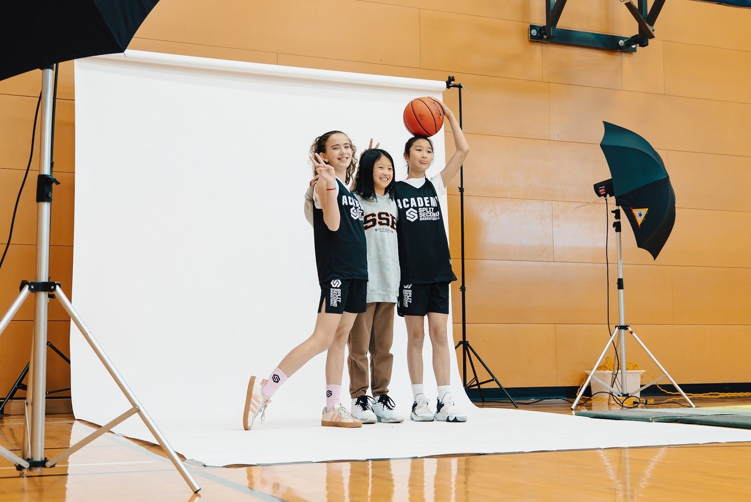 Academy players laughing on the photo set