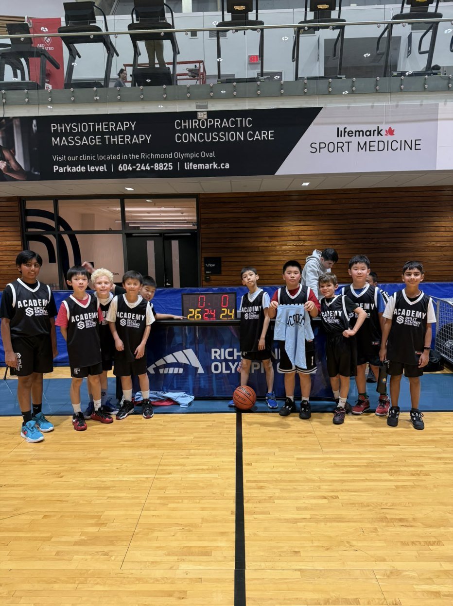 Sam's team photo with the Player of the Game shirt