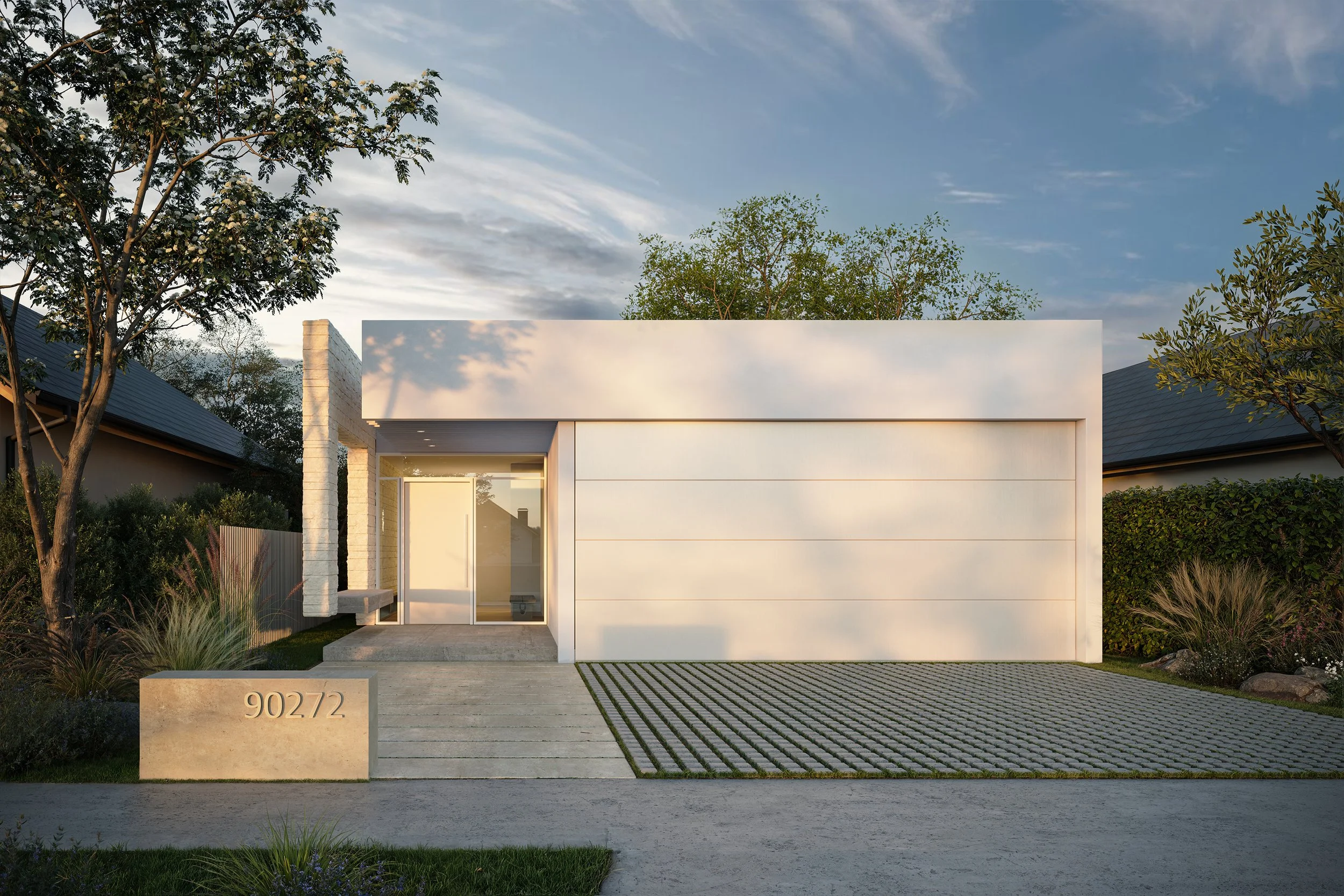 A modern, white single-story home features a minimalist facade with a flat roof, a glass-fronted entrance, and a permeable paver driveway under a soft twilight sky.