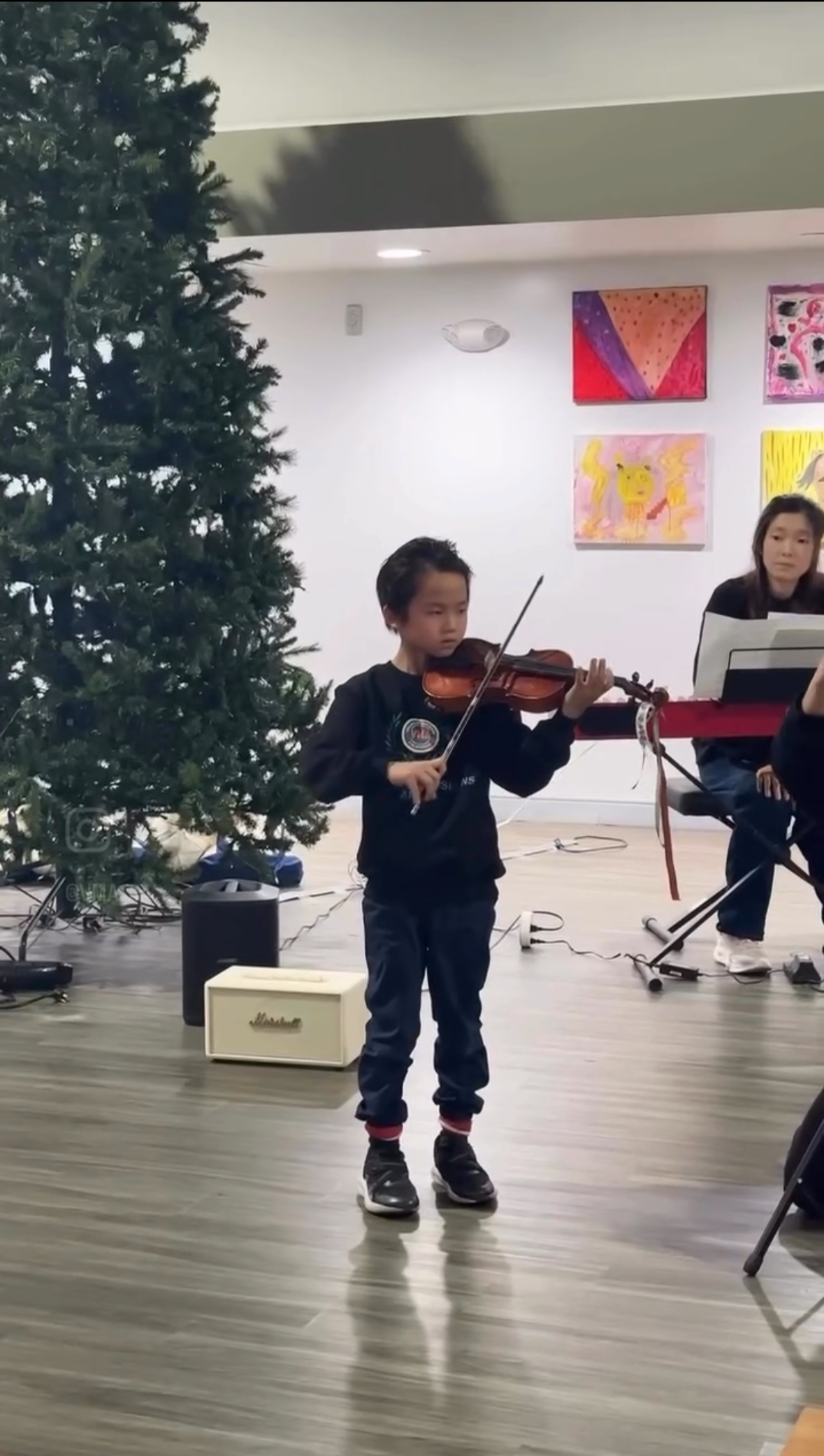 Students performing for assisted living residents