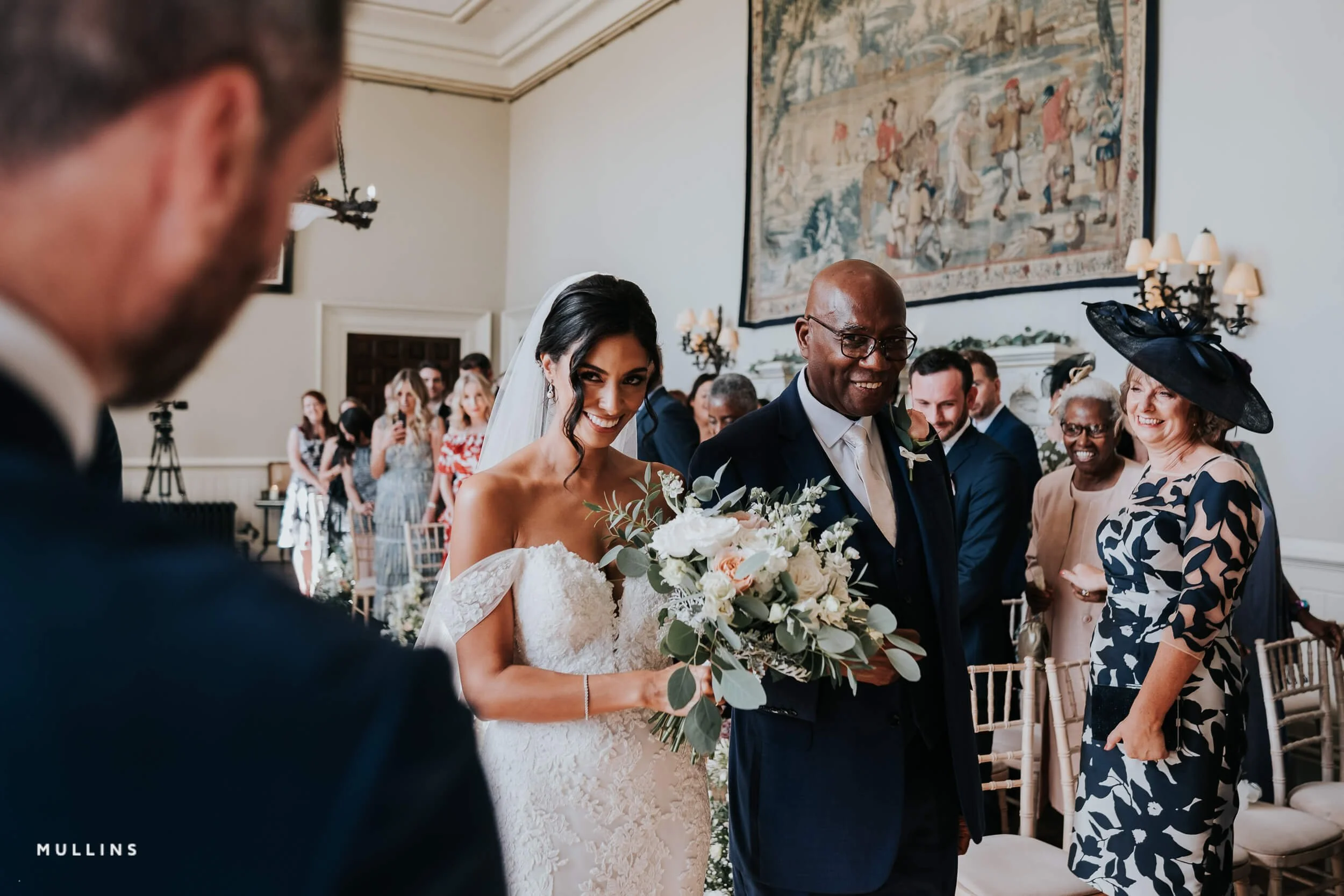 Bride and groom see each other for the first time on their wedding day