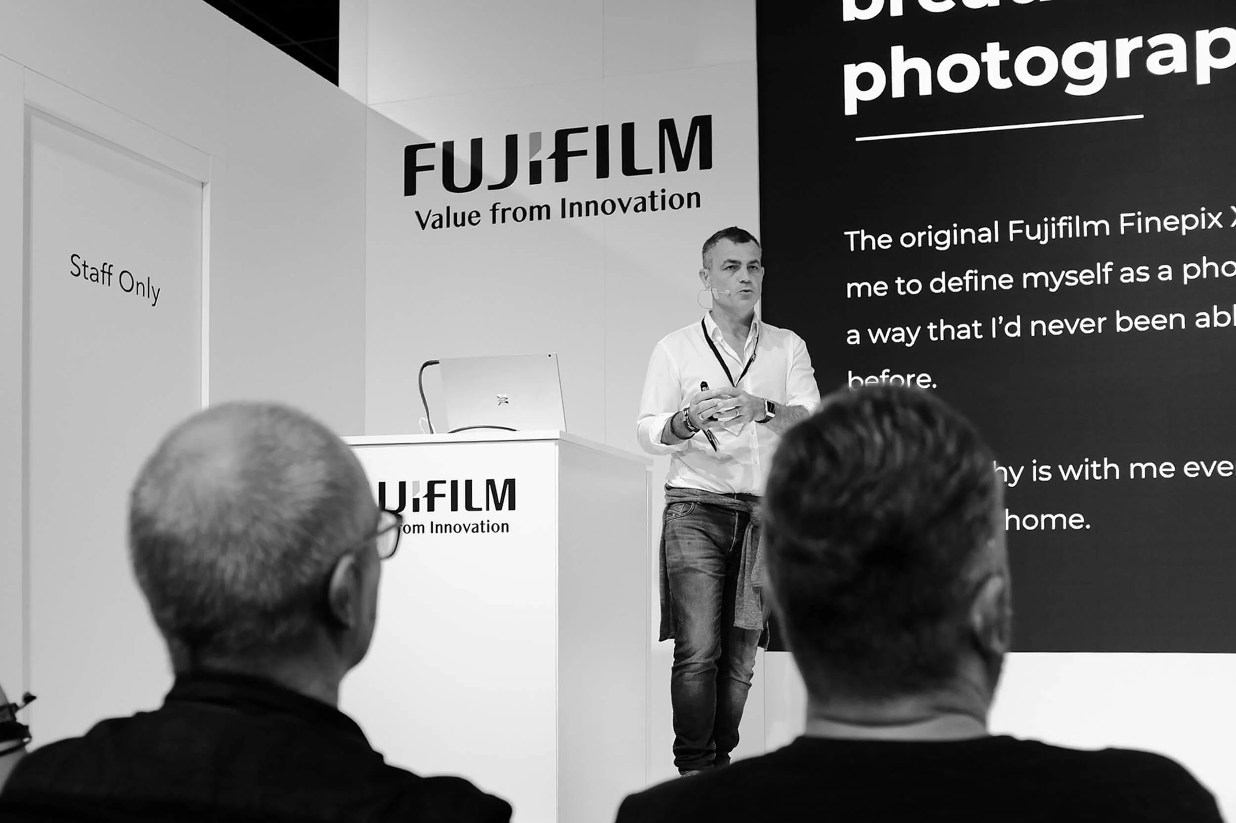 Photographer Kevin Mullins holding a Fujifilm Camera