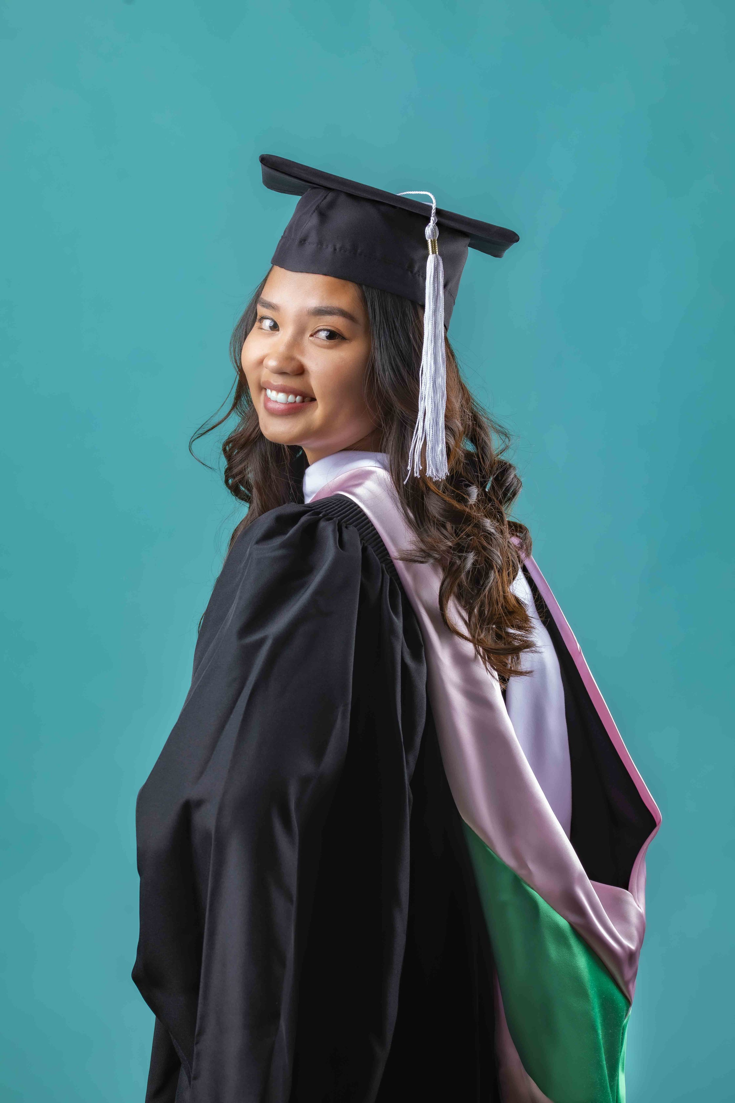 Graduate celebrating a milestone in a T3 Photography portrait