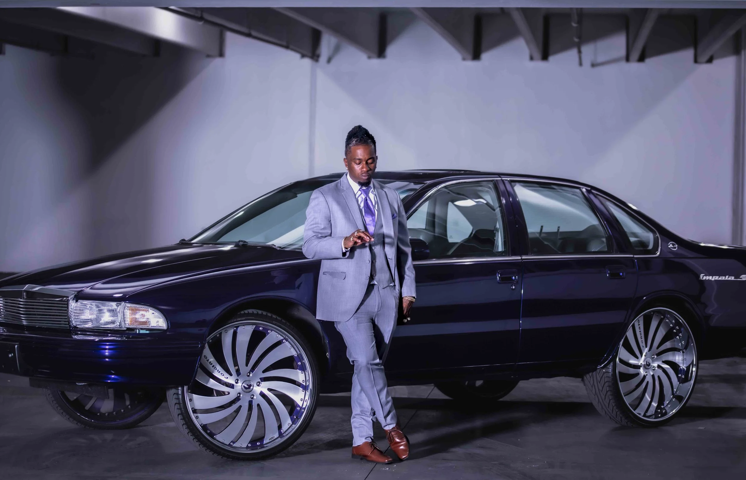 Editorial male portrait with luxury car by T3 Photography