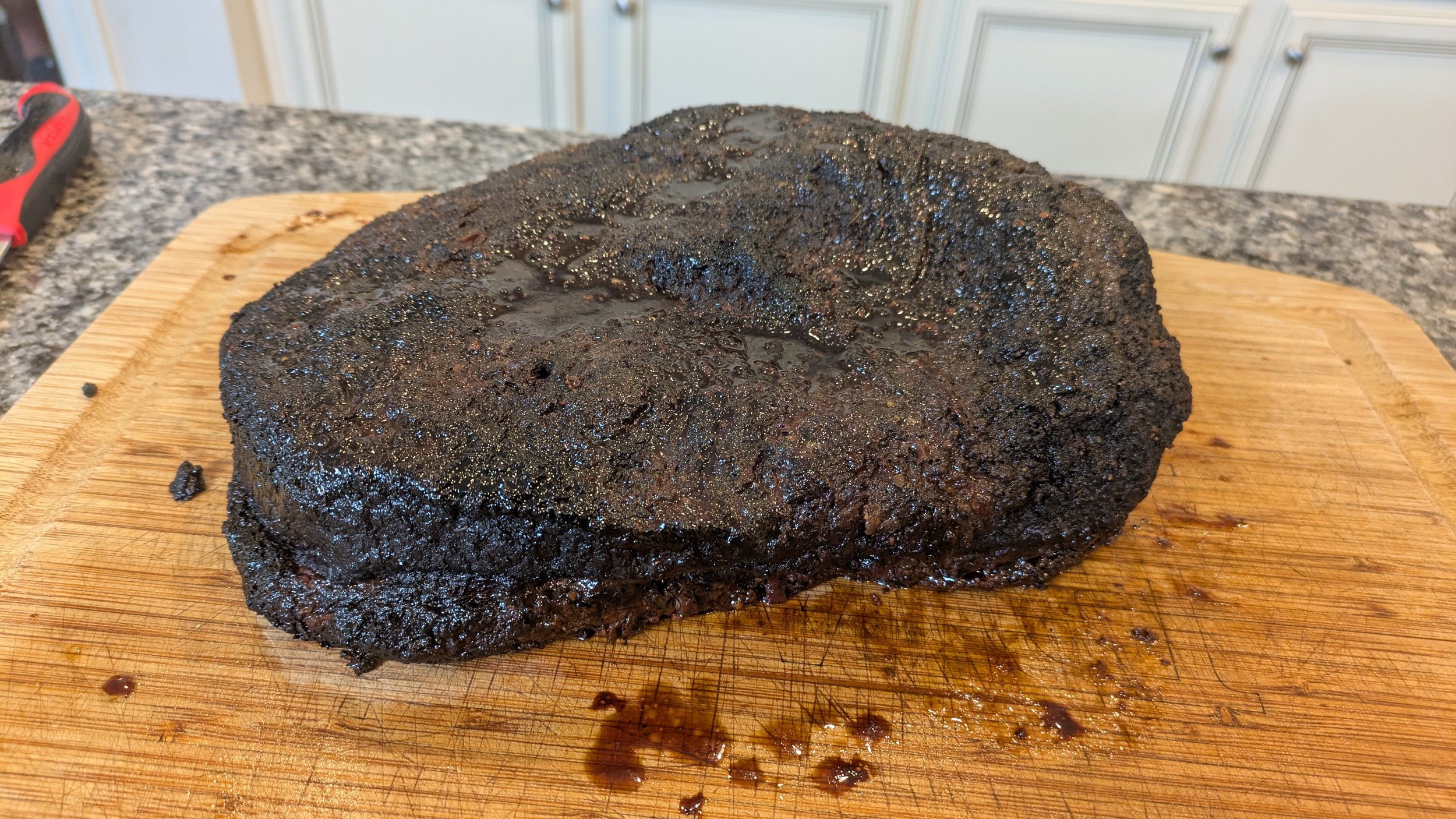 Brisket on the offset smoker before the wrap