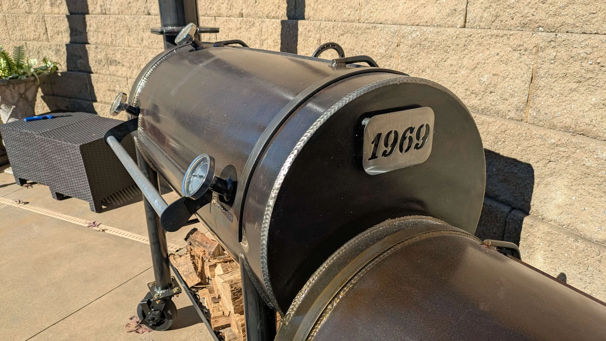 Offset smoker fired up with post oak