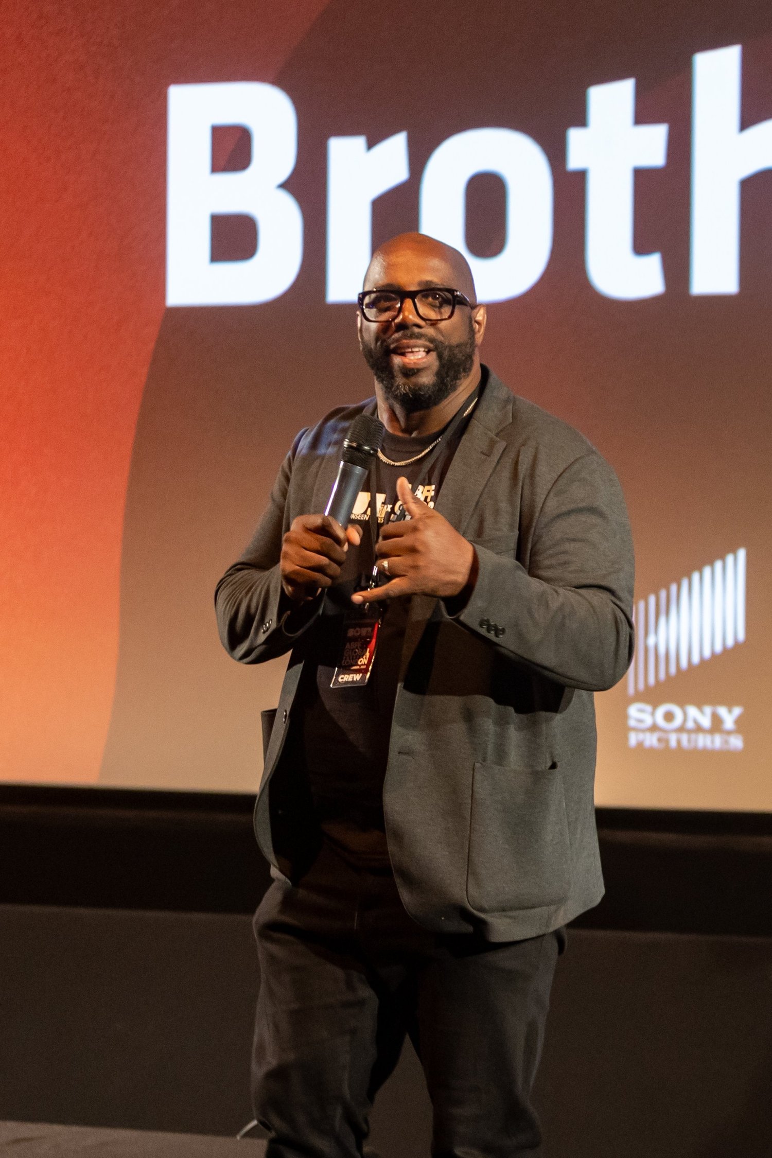 Iyare Igiehon speaking on stage at S.O.U.L. Fest