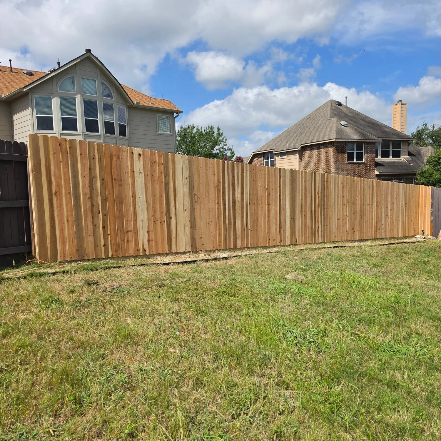 Completed six-foot side-by-side cedar fence replacement in Stone Oak