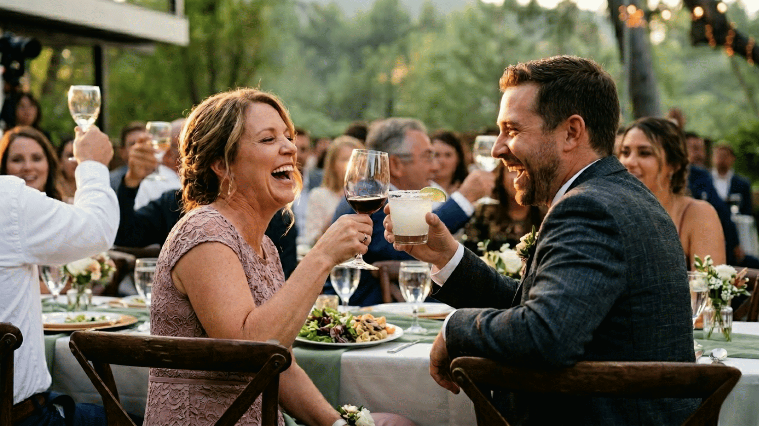 Wedding guests toasting at Gibroni's catering event