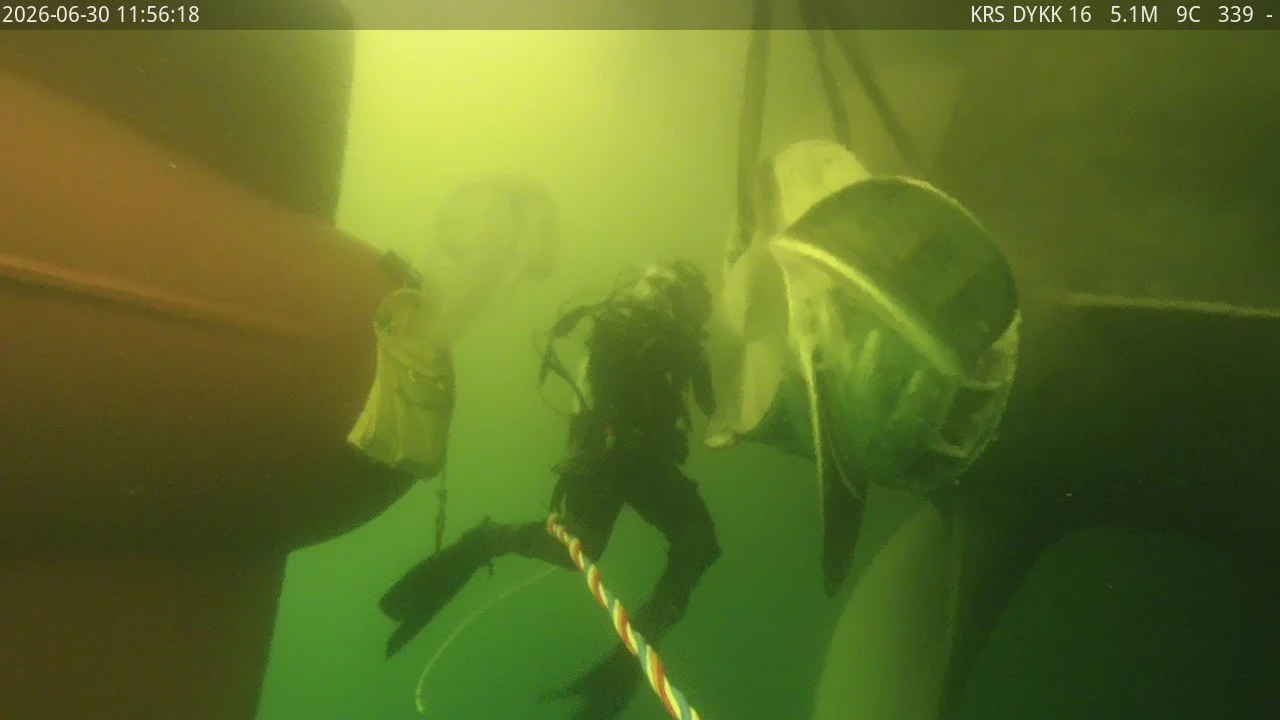 Commercial diver at the propeller of M/V Misago Arrow during in-water PBCF inspection and installation in Grenland, Norway
