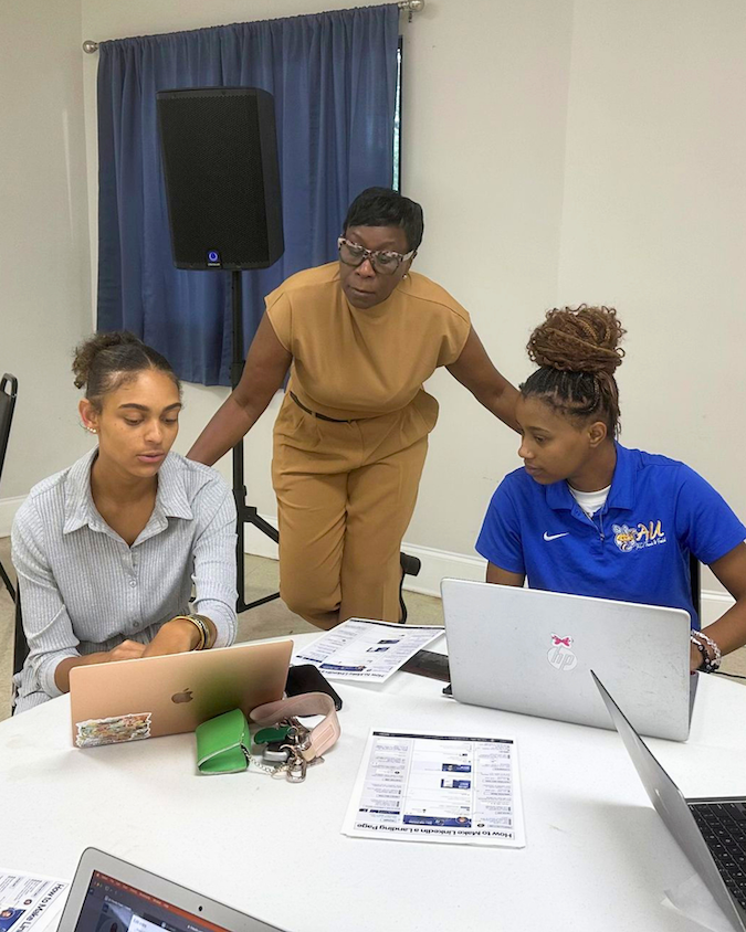 Mrs. Karla Harper helping Allen students