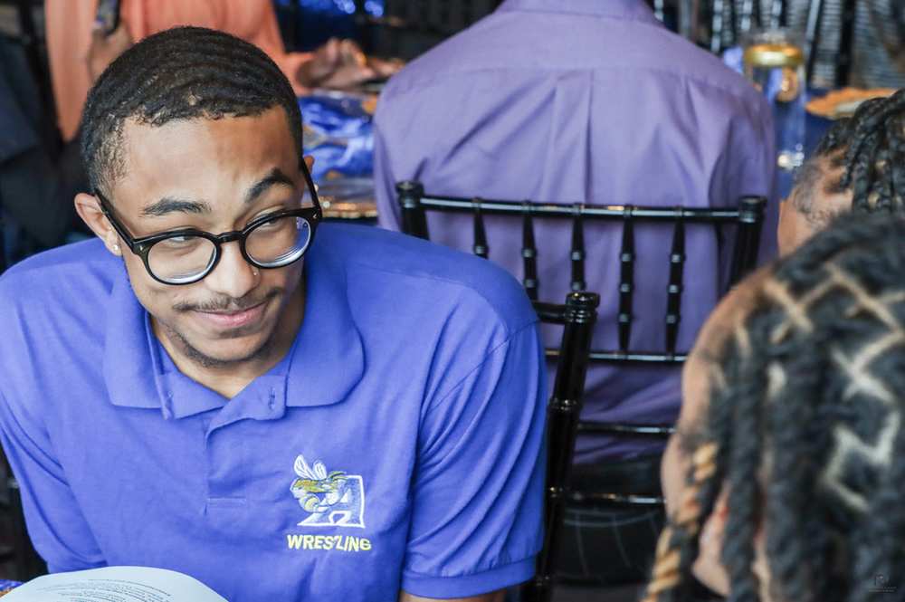 An Allen student smiling at a campus event