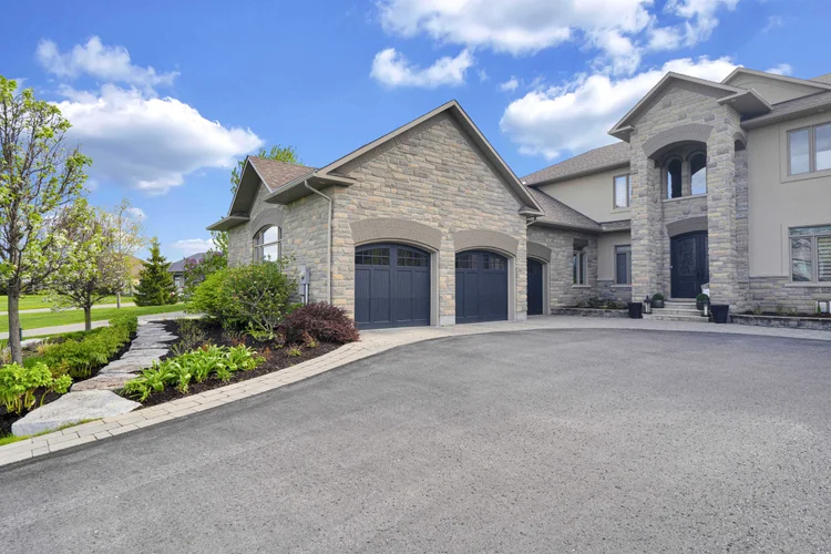 Front exterior and landscaped entrance at 812 McManus