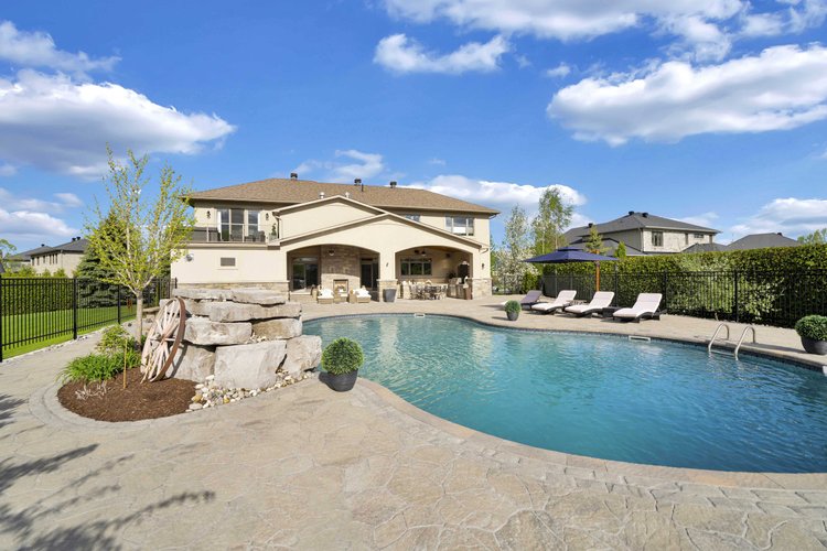 Pool and surrounding terrace at 812 McManus Avenue