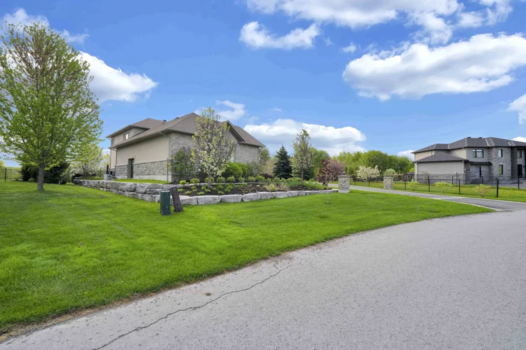 Front exterior and landscaped entrance at 812 McManus Avenue