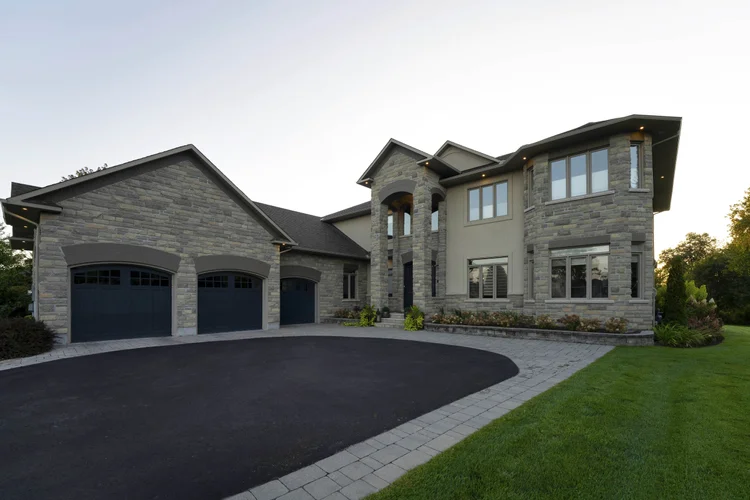 Front exterior at sunrise at 812 McManus