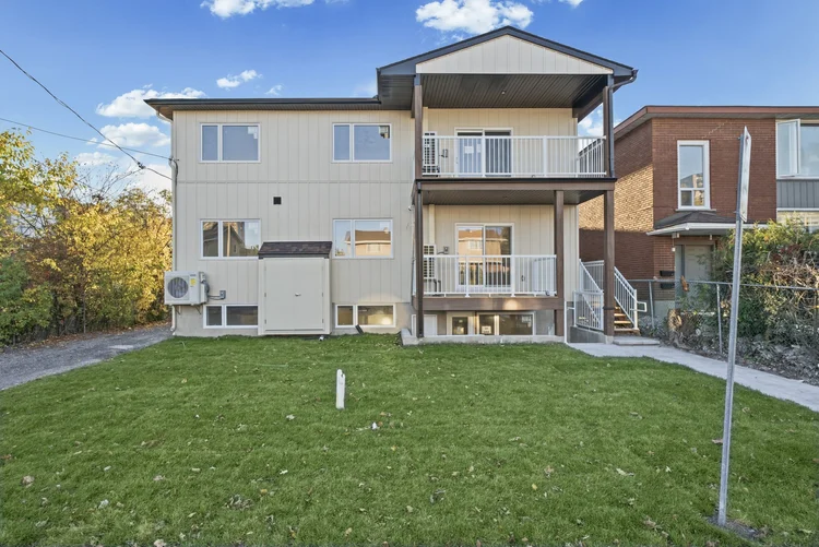 Main building exterior at 330B–328 Poulin