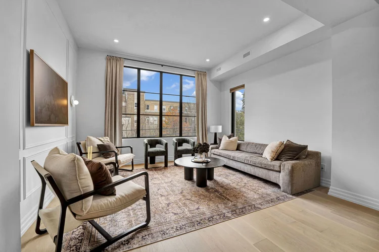 Living room and tall windows at 248 Main Street