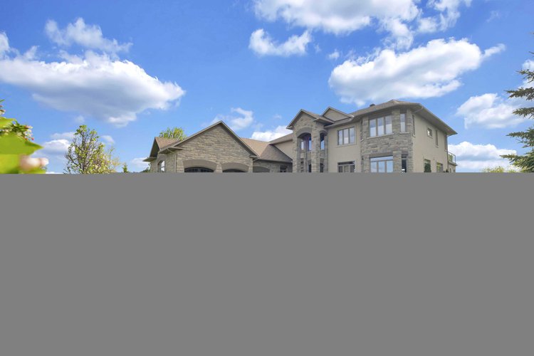 Front exterior and landscaped entrance at 812 McManus