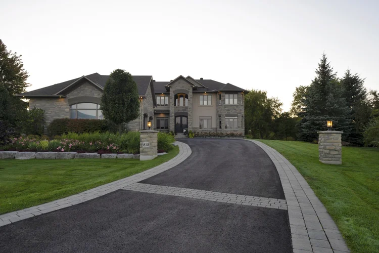 Front exterior at sunrise at 812 McManus