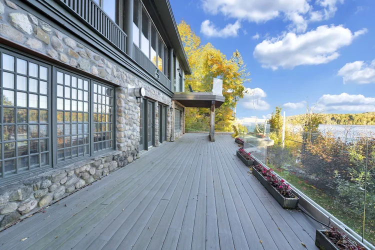 Long deck beside the lakeside home at 755 Ch. du Lac-Meech, Chelsea