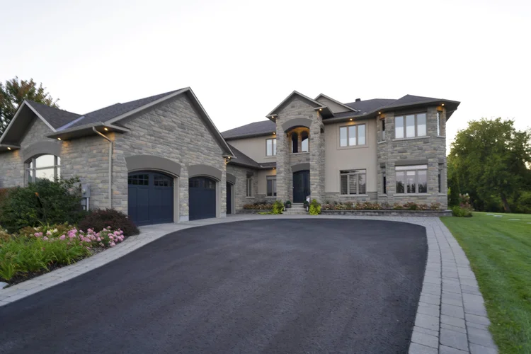 Front exterior at sunrise at 812 McManus