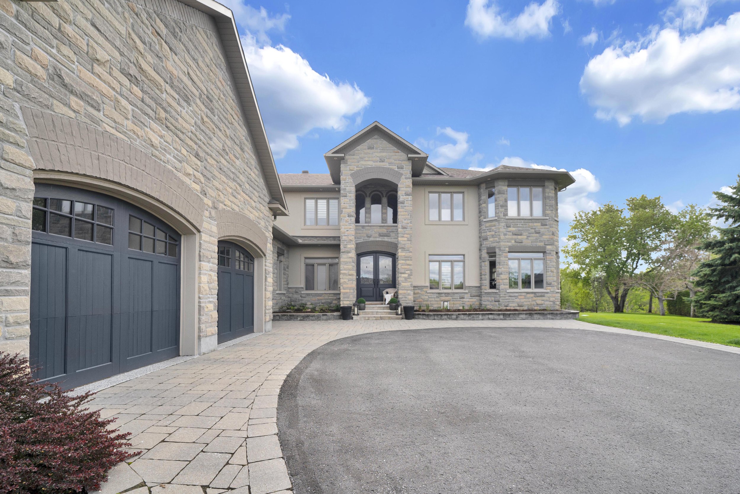 Front exterior and landscaped entrance at 812 McManus