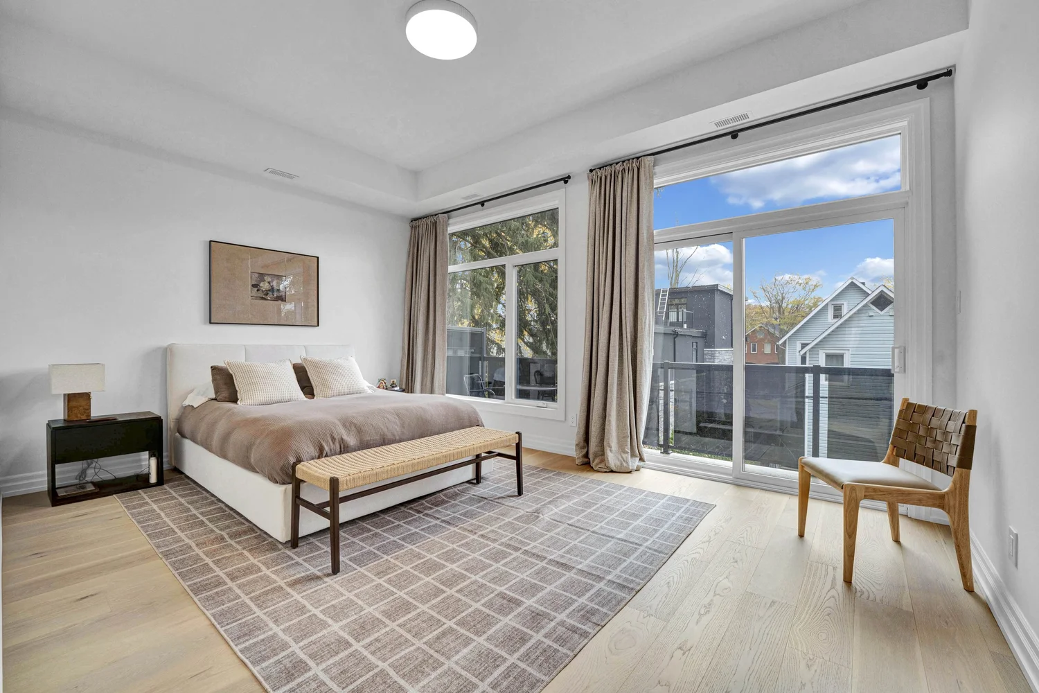 Bedroom with balcony access at 248 Main Street