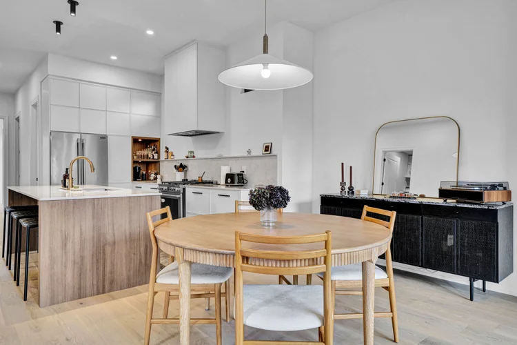 Dining table and kitchen at 248 Main Street