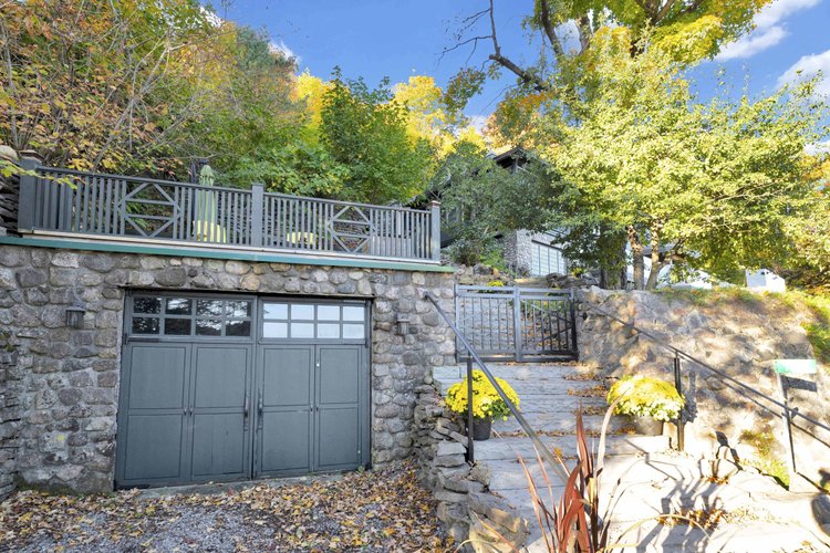 Garage and stone retaining walls at 755 Ch. du Lac-Meech, Chelsea