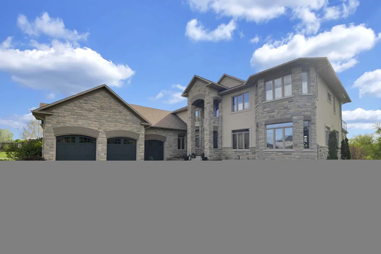 Front exterior and landscaped entrance at 812 McManus