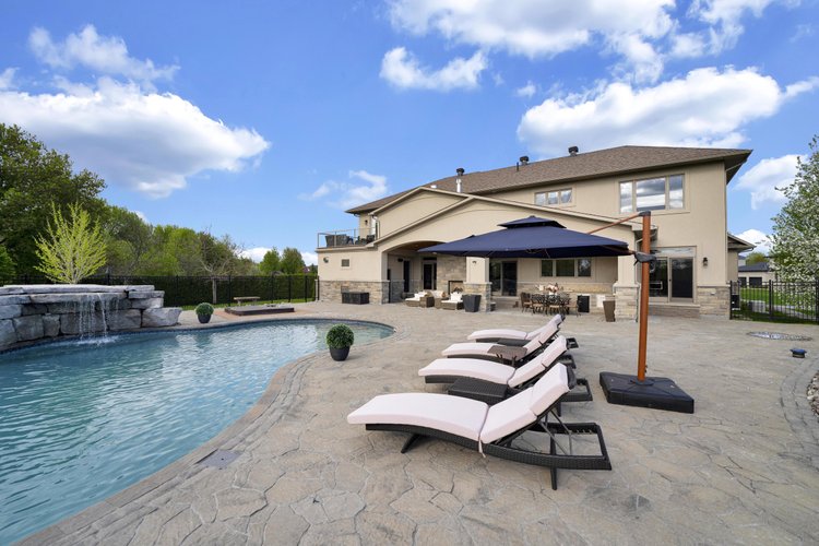 Pool and surrounding terrace at 812 McManus Avenue