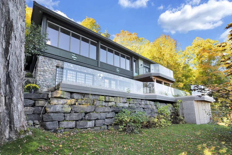 Lower level exterior and deck at 755 Ch. du Lac-Meech, Chelsea