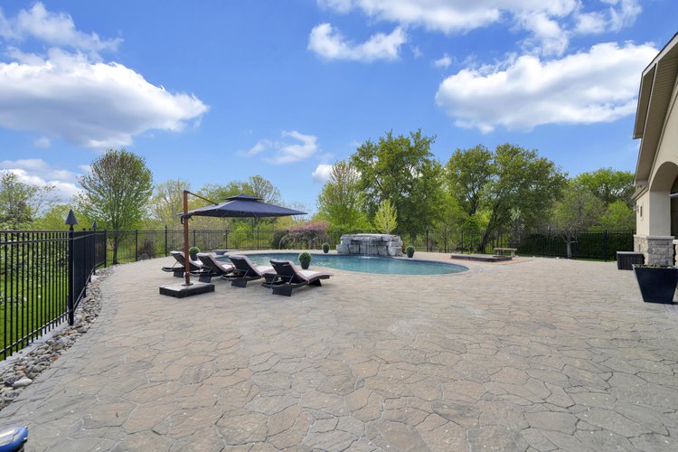 Pool and surrounding terrace at 812 McManus