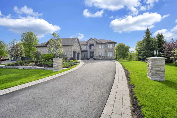 Front exterior and landscaped entrance at 812 McManus Avenue