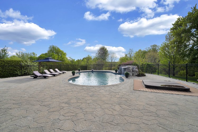 Pool and surrounding terrace at 812 McManus