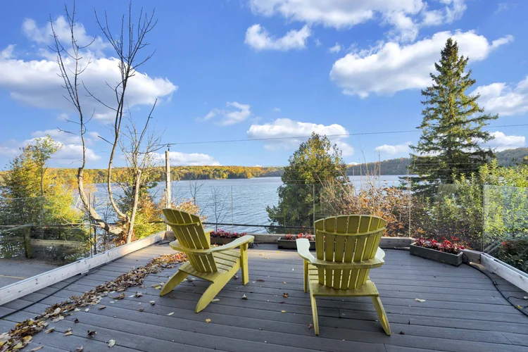 Adirondack chairs on the terrace at 755 Ch. du Lac-Meech, Chelsea